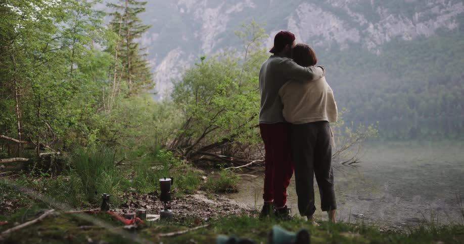 A man and woman hiking outdoors