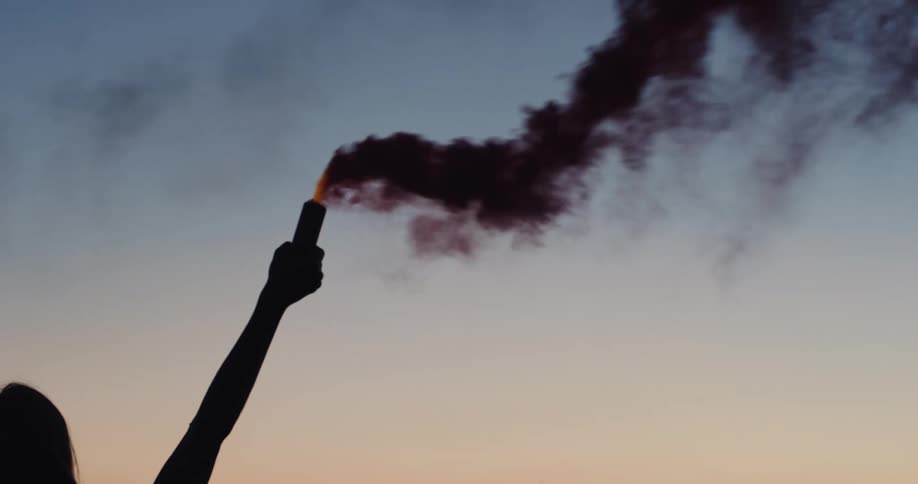 Woman holding smoke