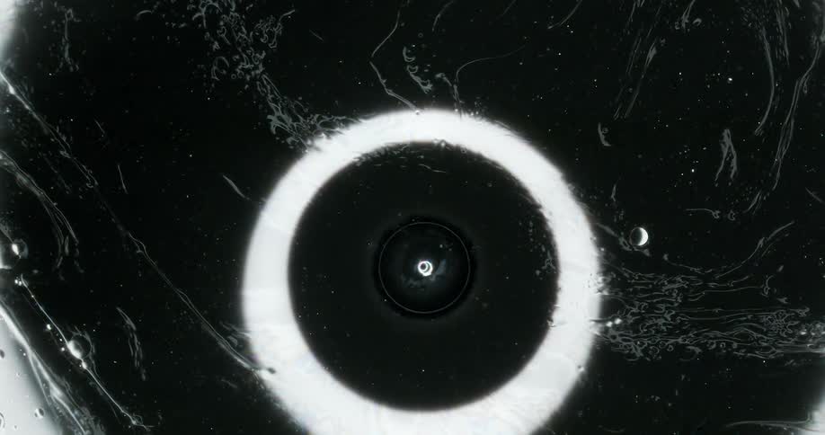 Abstract footage of liquid moving with lights making patterns