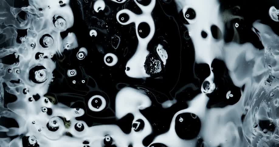 Black white and gray colors that look like oil and light