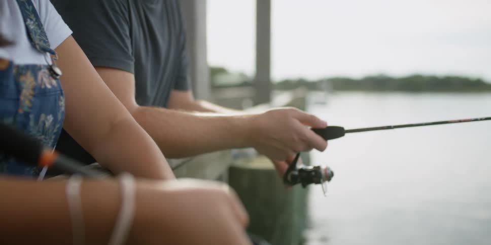 Male and female fishing