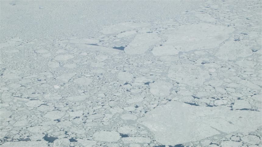 A snow covered body of water
