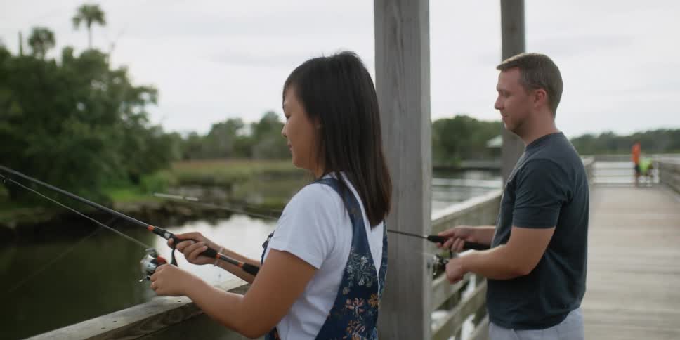 Male and female fishing