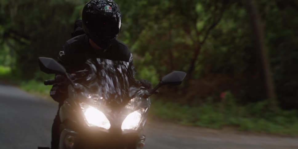 A person driving a motorbike
