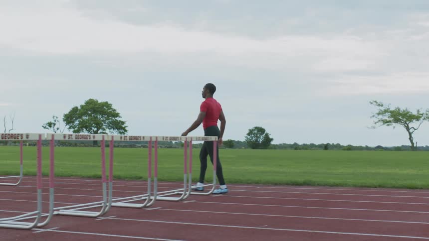Man walking on a running track