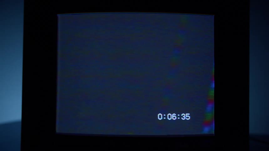 A television screen is displayed in a room