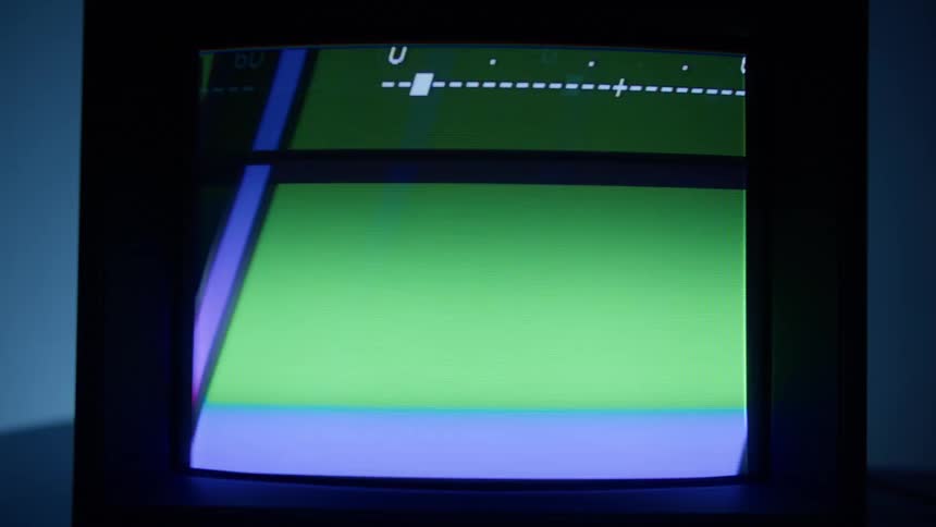 A screen displays a flickering patch of colors and a number scale