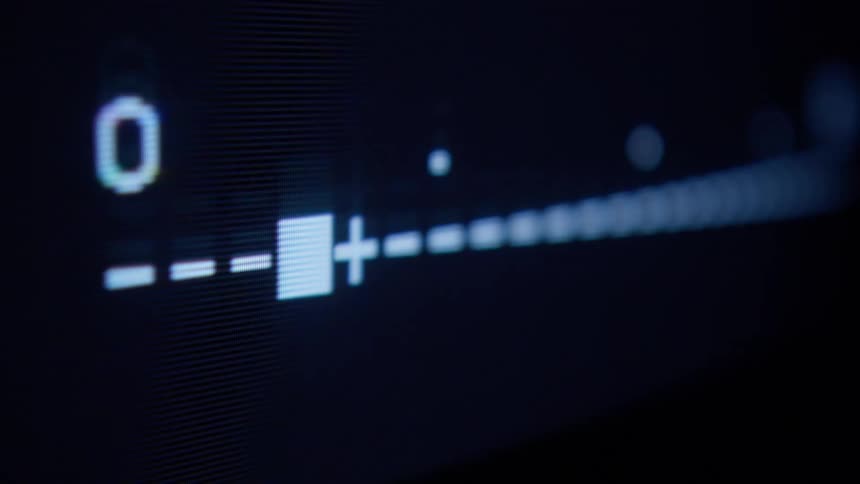 A television screen changing colors from black to blue