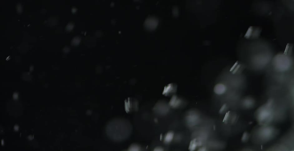 Bubbles rising against a black background