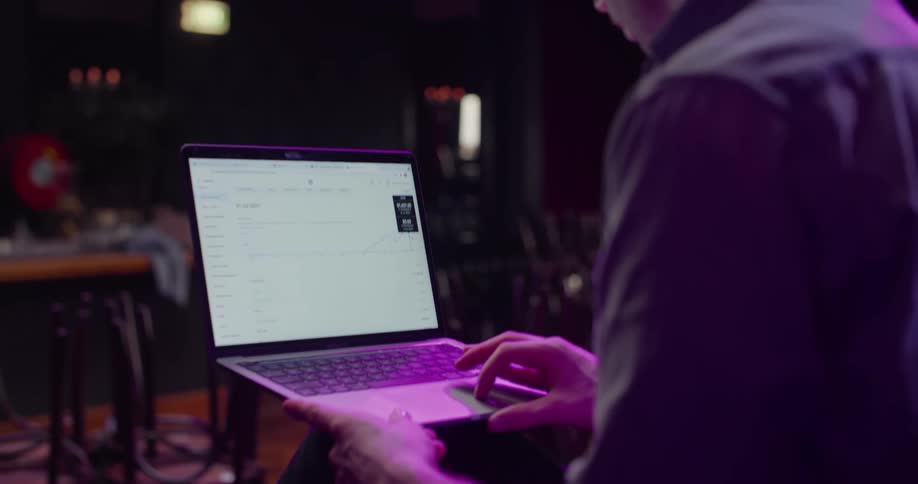 A close up of a person using a laptop