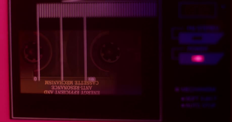 Cassette tape is set into tape player and begins to play
