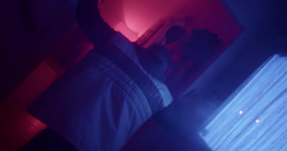 A man stumbles in the smoke filled house