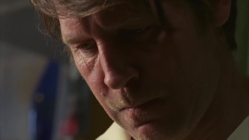 A man looks intently at his work