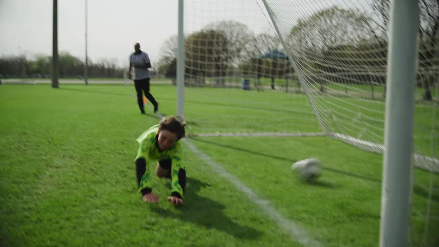 A goalie missing a goal
