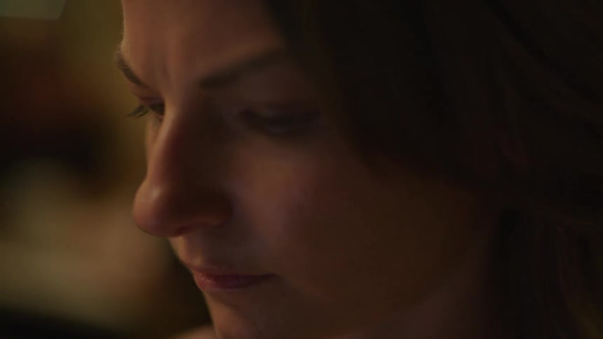 A close up portrait of a concentrating woman