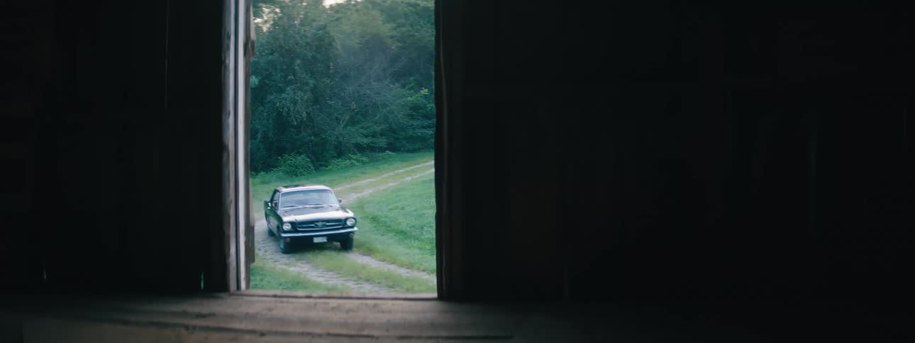 A car driving around on a dirt road