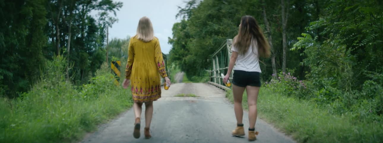 Two women that are hiking outdoors