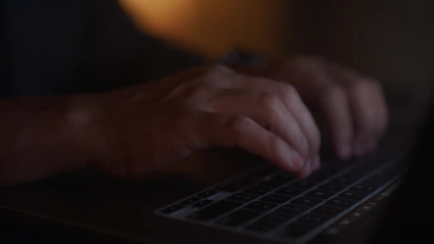 A close up of someone using a keyboard