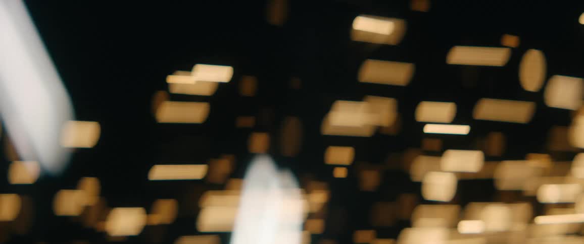 Sparks fly through the air from a metal grinder