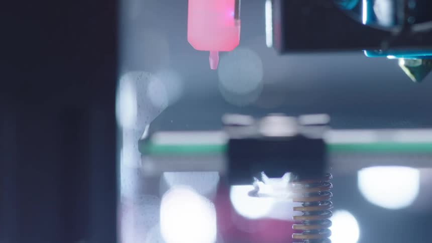 Machine lowers until part that touches rotating reflective surface retracts