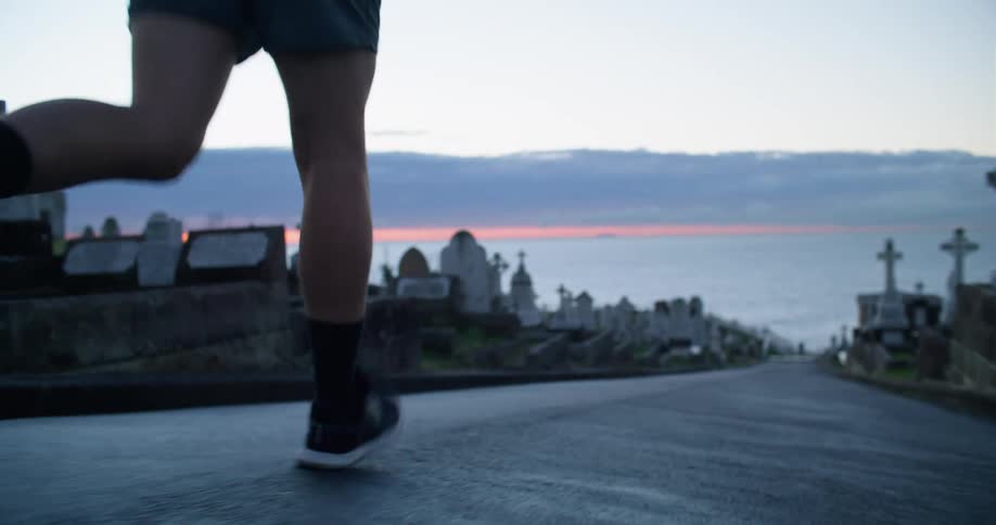 A man that is running outdoors
