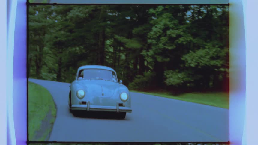 A car is driving on a road