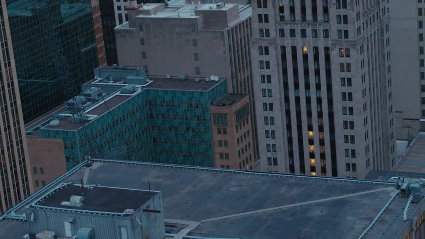 Aerial view of a downtown city is displayed in the daytime
