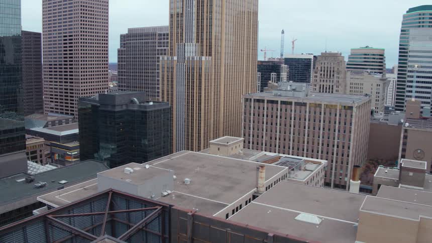 City street runs between the skyscrapers