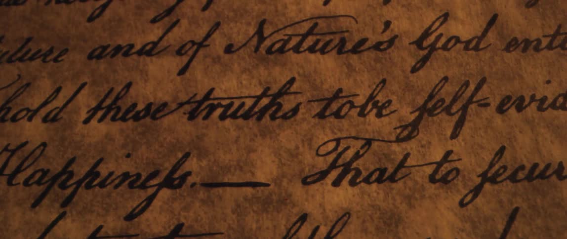 A view of a piece of paper with calligraphy writing on it