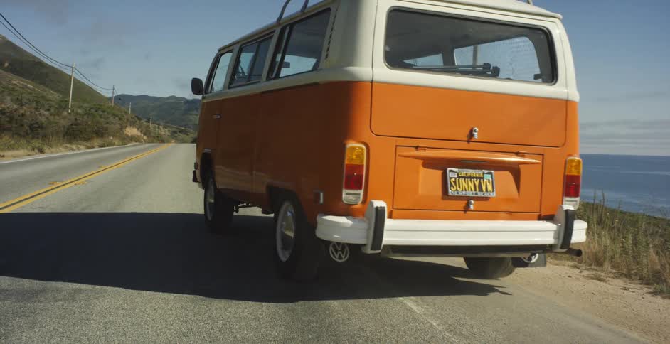 The van pulls off onto the road to drive away