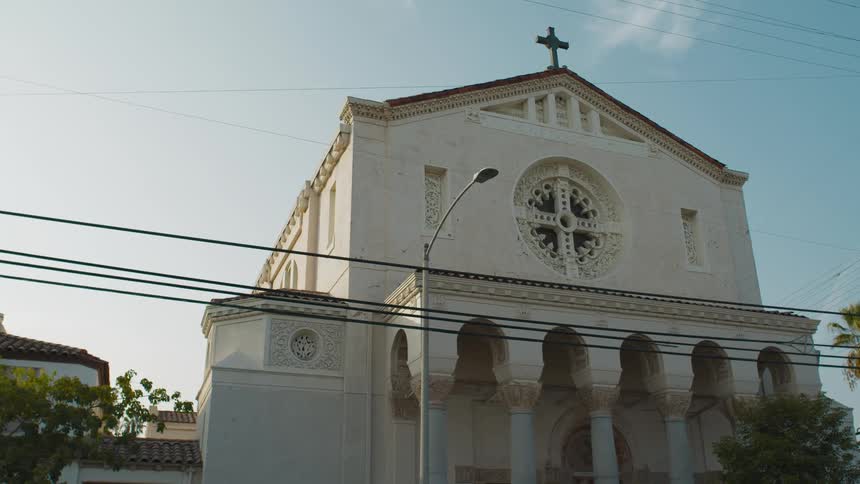 A church is displayed in a city during spring