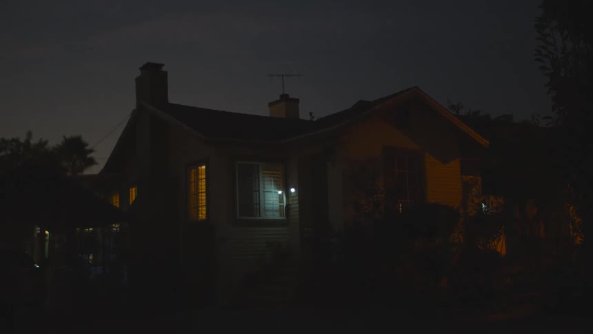 The outside of a house at night