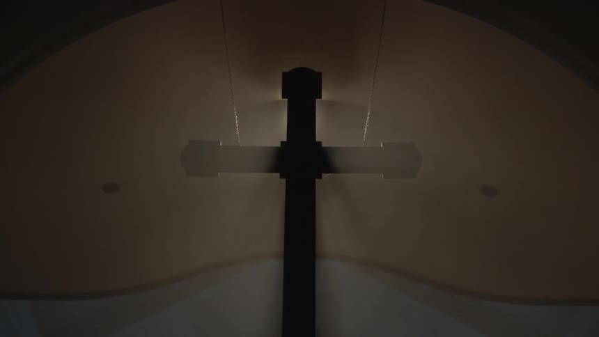 Sunlight shining on a cross