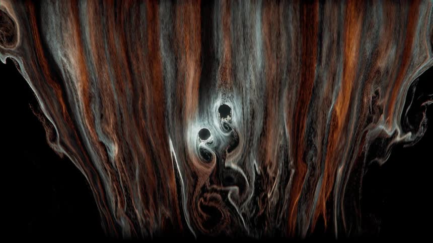 Swirls of paint and dye flow downwards and around two obstacles