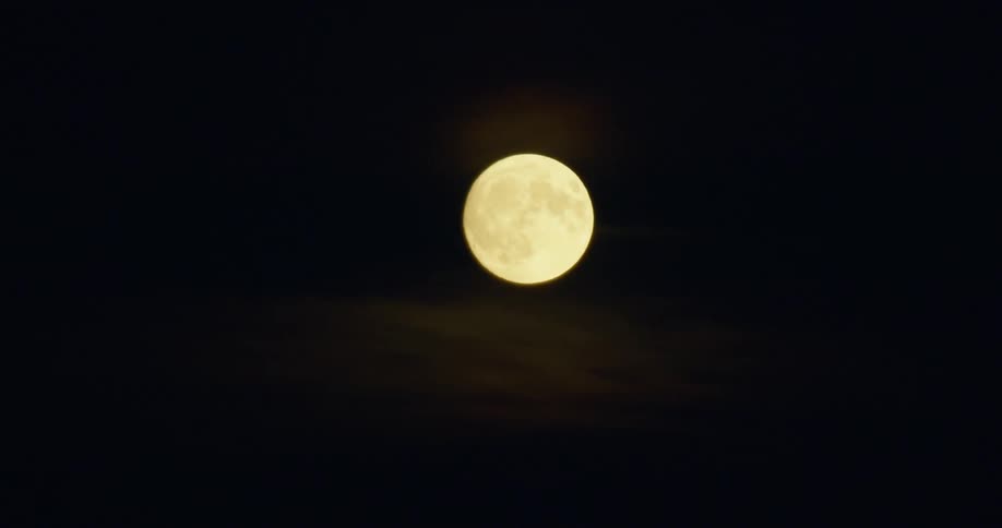 Full moon is shining brightly in the night sky