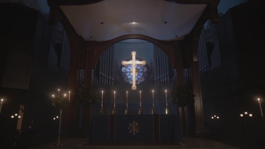 Illuminated cross in a shrine area