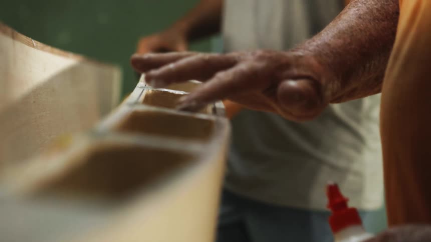 Person spreading glue