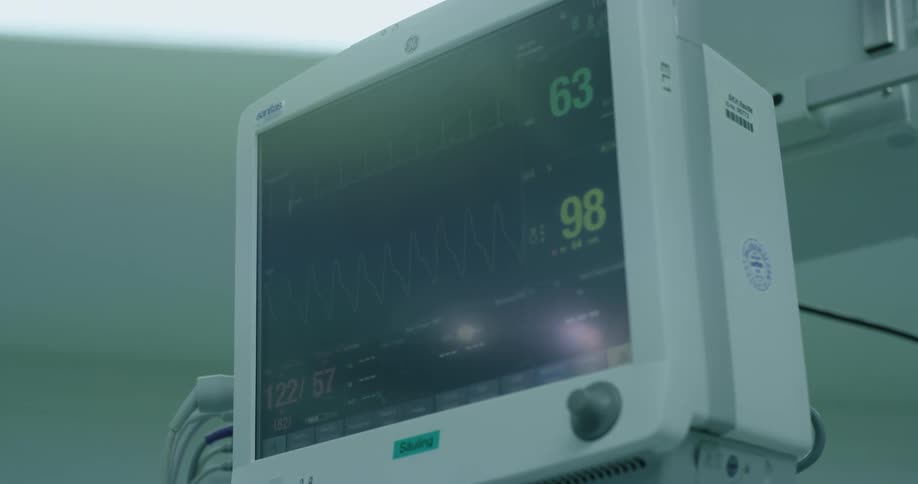 Medical monitor screen shows graph and numbers