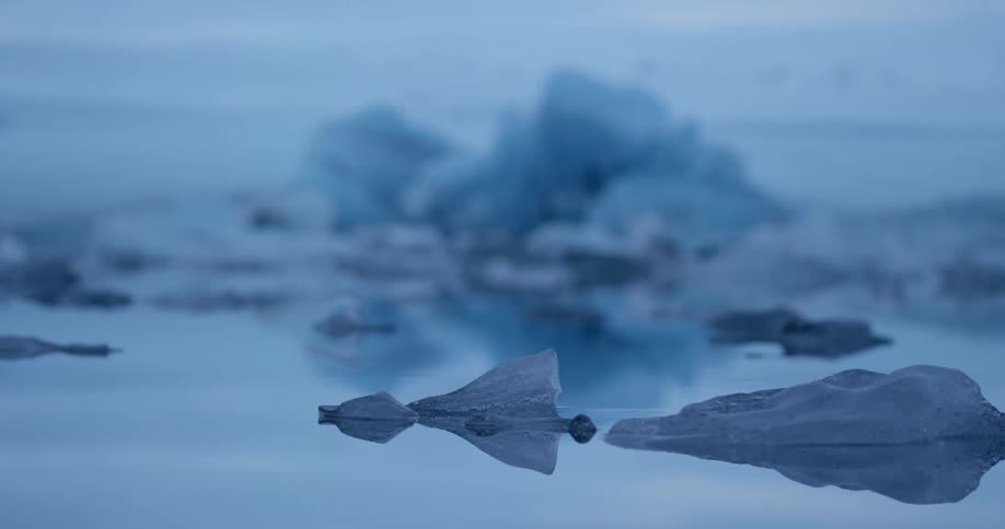 Frozen body of water with glacial ice and snow