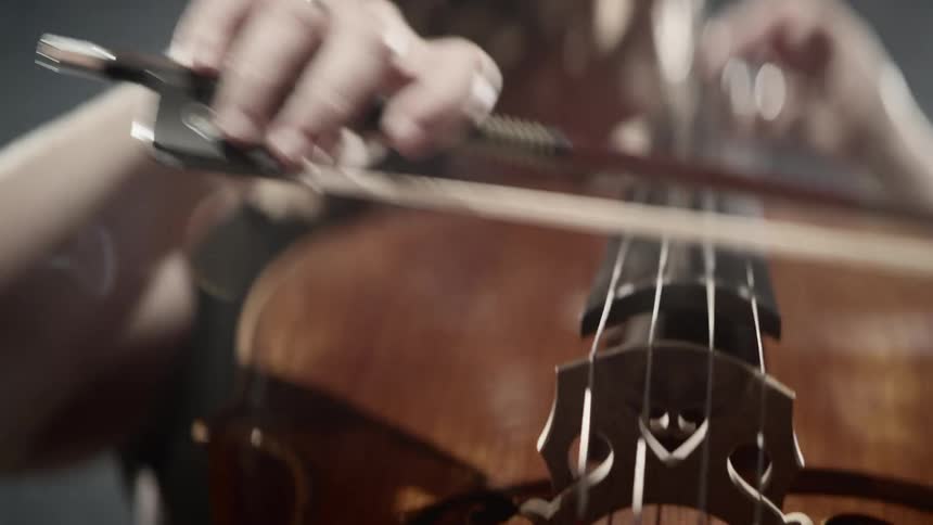 A woman plays the cello