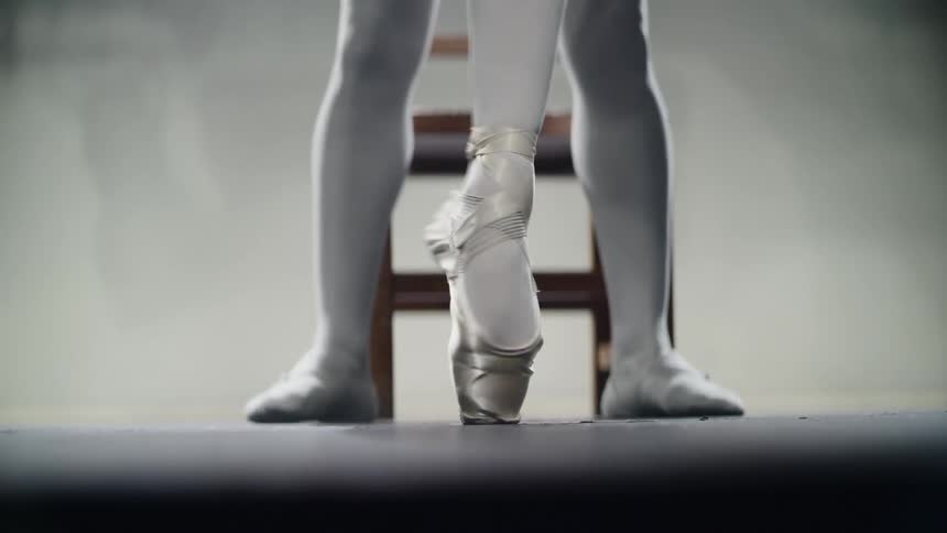 A close up of a ballet dancers foot