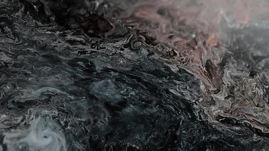 Black liquid flowing