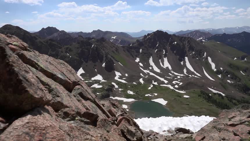 Snowy mountains on a partly cloudy day