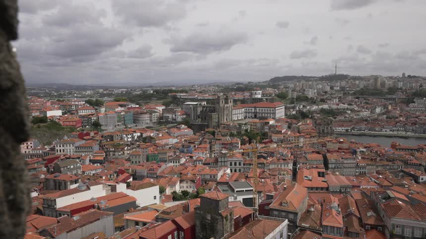 Past the stones is a large town with many homes