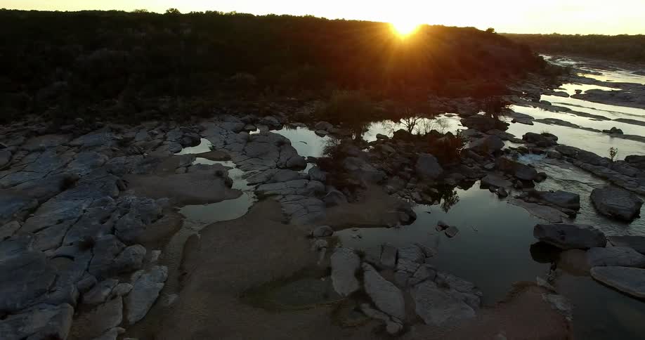 Aerial view of a stream with many rocks