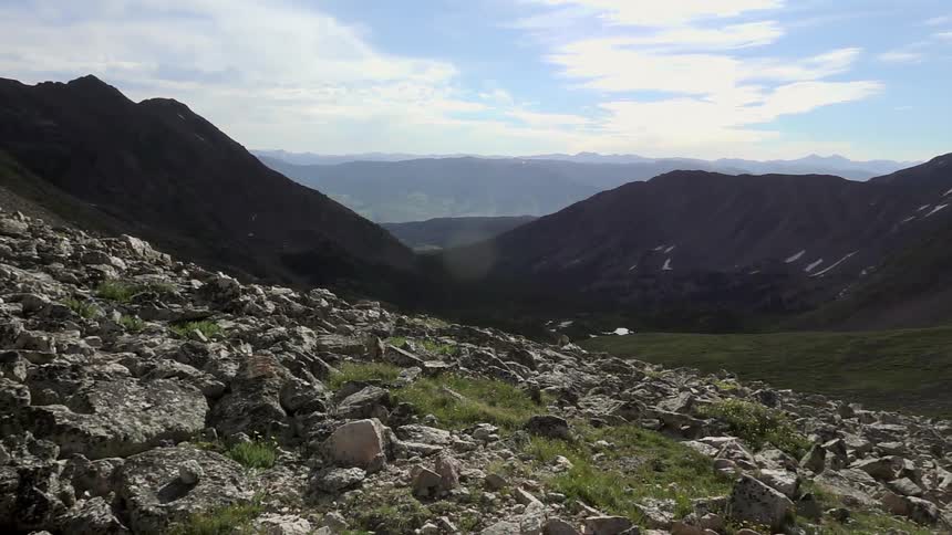 View of rocks and mountains on a sunny day