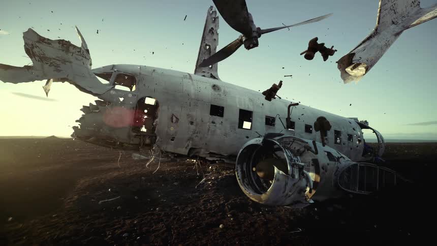 An old airplane on a landscape with debris coming off of it with the sky and clouds in the background
