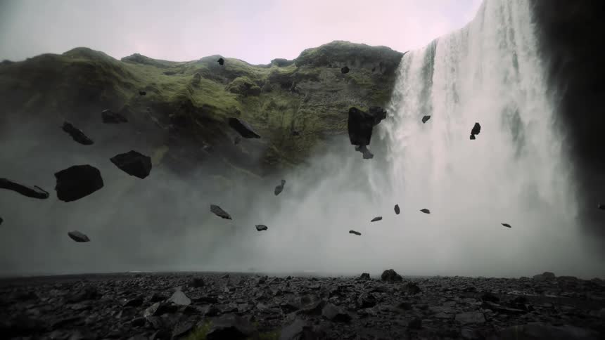 A waterfall falls upwards as large rocks float in the air