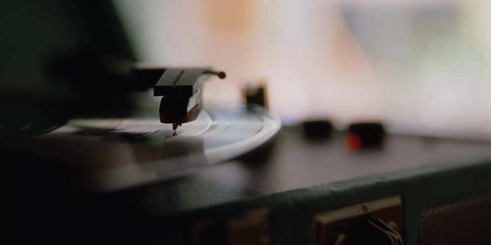 A record player spins a record on its needle