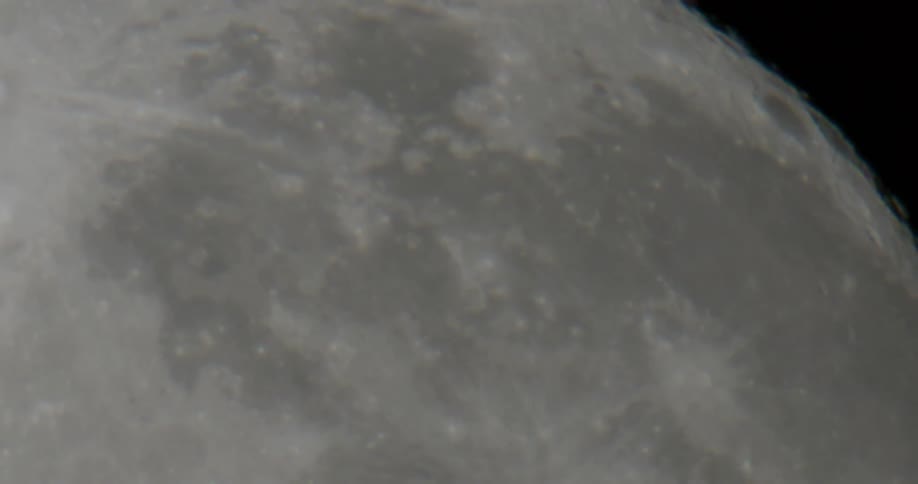 Whiteof lunar surface contrasts with black of space
